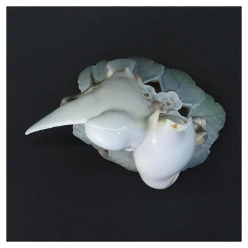 Porcelænsfigur med fuglemotiv fra Royal Copenhagen (str. 12,5 cm)