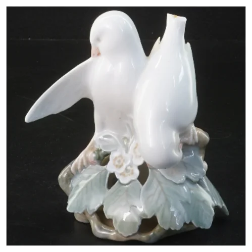 Porcelænsfigur med fuglemotiv fra Royal Copenhagen (str. 12,5 cm)