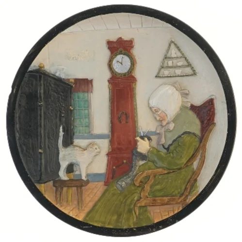 Dekorativt vægophæng med figurativt motiv (str. 24x3 cm)