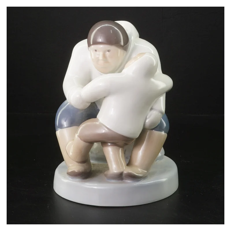 Porcelænsfigur af far med barn fra B&G (str. 21 cm)