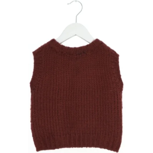 Strikket vest fra The New (str. 110)