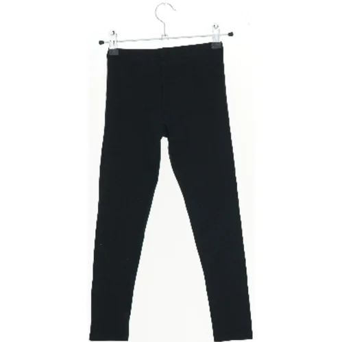 Sort leggings fra H&M (str. 122)
