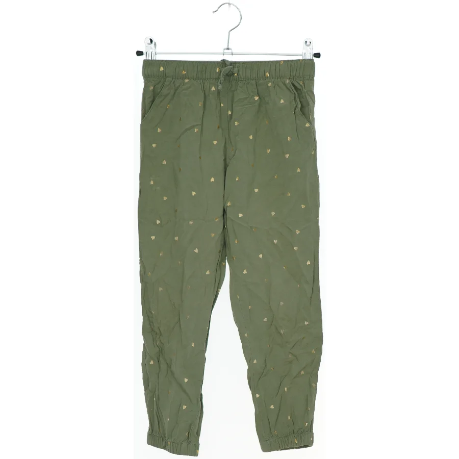 Grønne bukser med guld prikker fra H&M (str. 122)