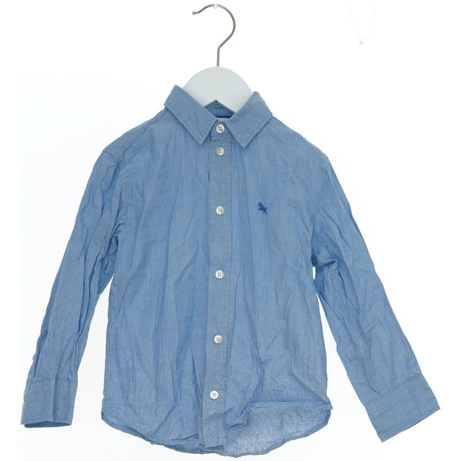 Lyseblå langærmet skjorte fra H&M (str. 104)