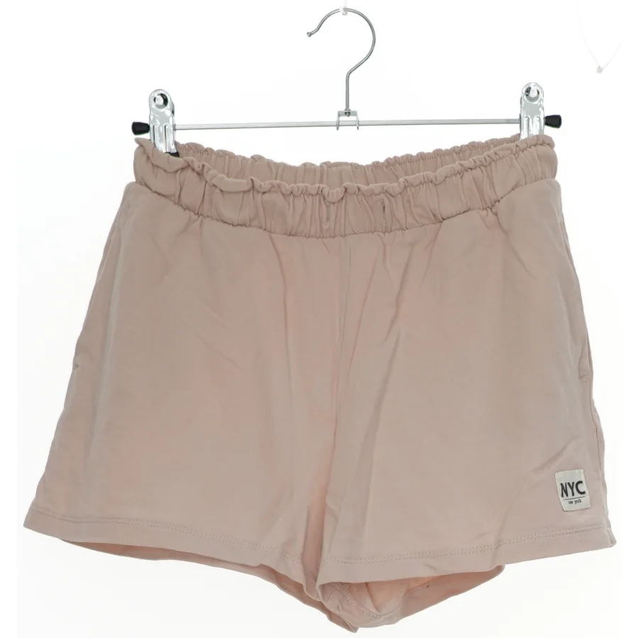 Lyserøde shorts fra H&M (str. 158)