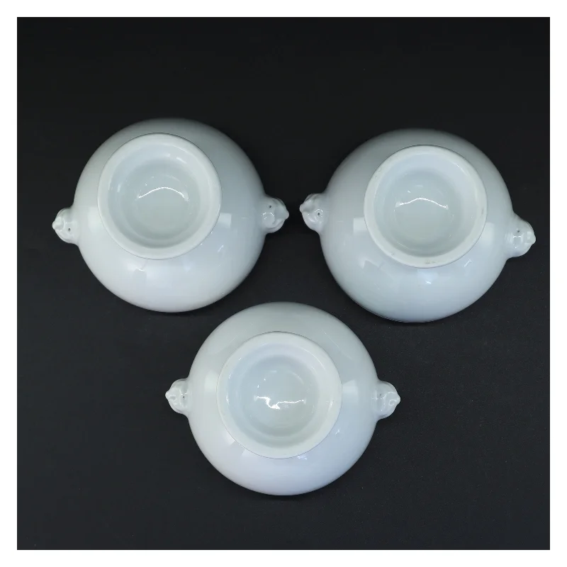 Hvide porcelænsskåle med håndtag (str. 9,5 x 14 x 12 cm)