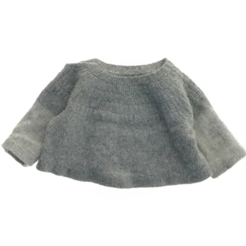 Strikket babytrøje i ren uld (str. Bryst. 25 cm. længde. 20 cm)
