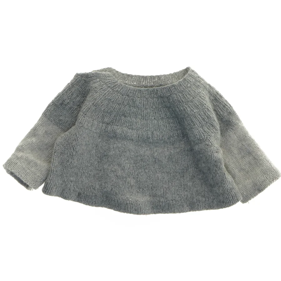 Strikket babytrøje i ren uld (str. Bryst. 25 cm. længde. 20 cm)