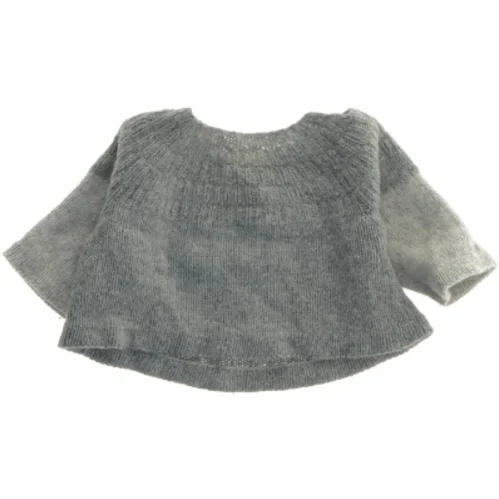 Strikket babytrøje i ren uld (str. Bryst. 25 cm. længde. 20 cm)