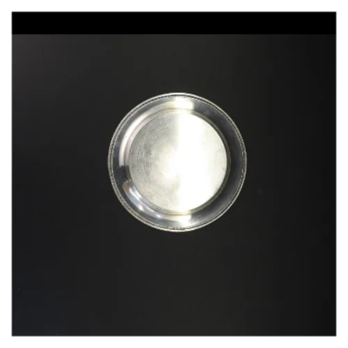 Sølvfarvet serveringsbakke (str. Diameter 19 cm)
