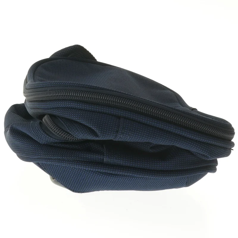 Blå skuldertaske med justerbar rem fra Cox (str. 30x18 cm)