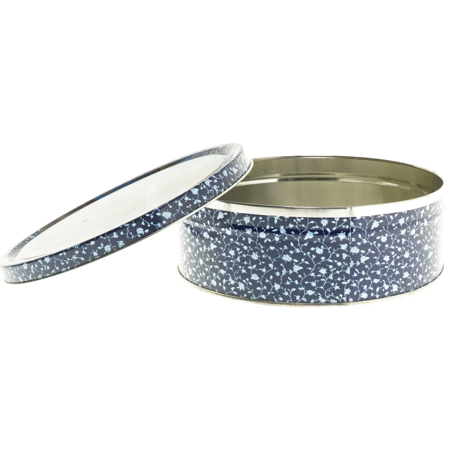 Rund metaldåse med blomstermønster (str. Ø 19,5 cm længde 6,5 cm)