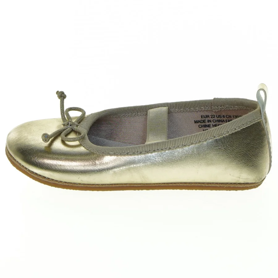 Guld ballerina børnesko fra H&M (str. 22)