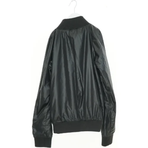 Overgangsjakke fra Koin (str. 146 cm)