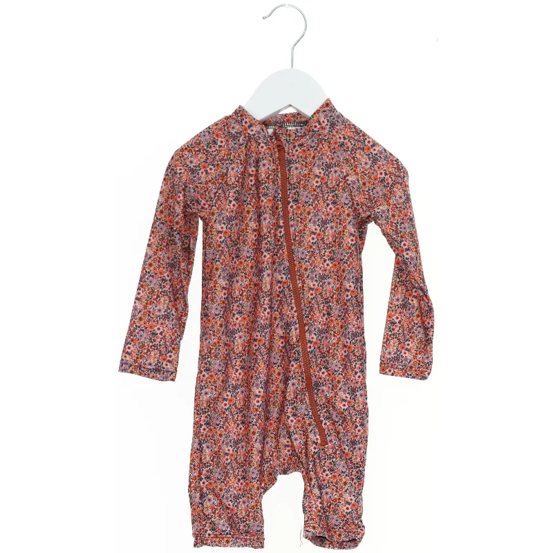 Badetøj - heldragt med blomsterprint fra VRS (str. 80)