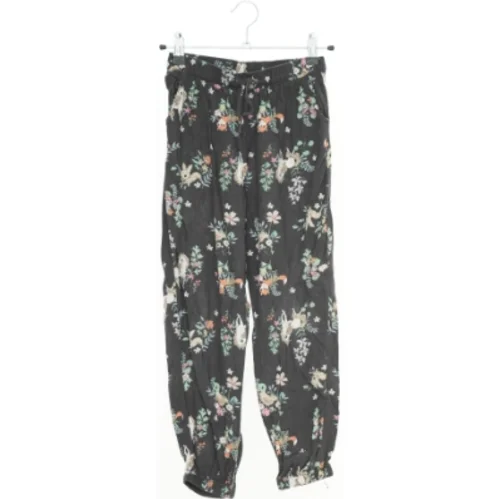 Bukser med blomsterprint fra H&M (str. 134)
