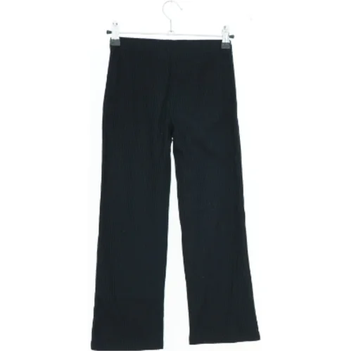 Sorte bukser fra C (str. 128)