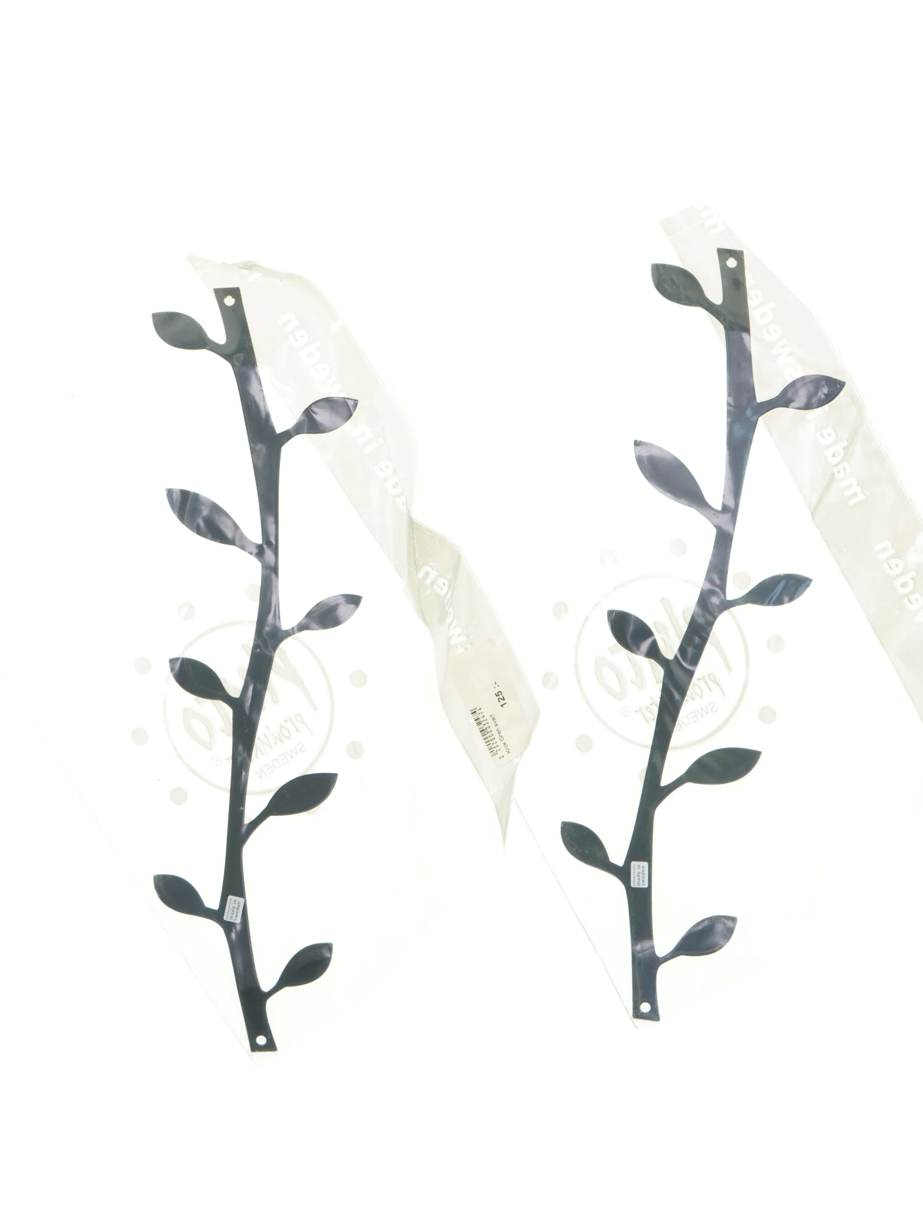 2 stk. knagerækker i sort metal (str. 37 cm)