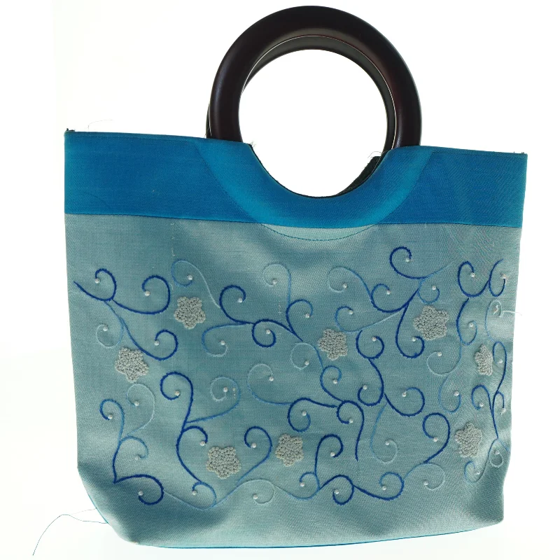 Blå håndtaske med dekoration (str. 31 x 31 cm)