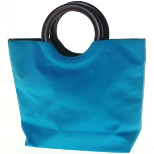 Blå håndtaske med dekoration (str. 31 x 31 cm)