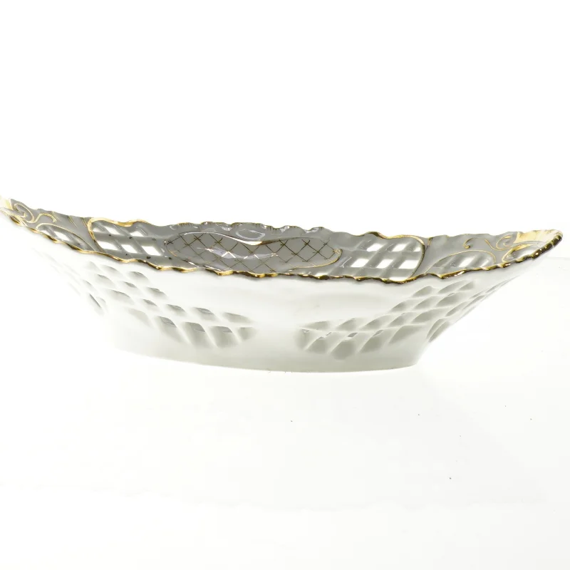 Porcelænsskål med gennembrudt mønster og guldkant (str. 29 x 30 cm)
