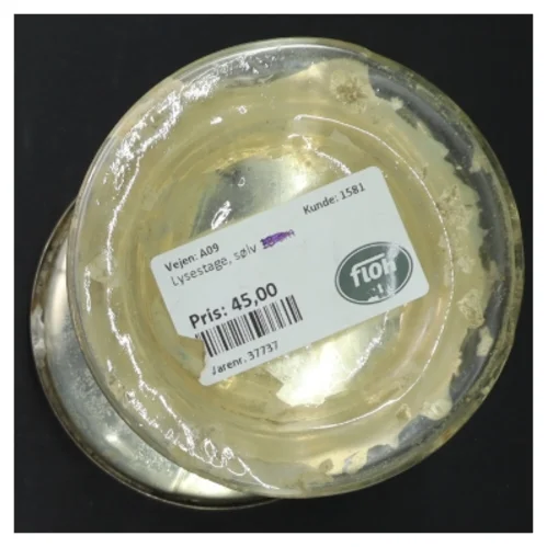 Glas lysestage med sølvfarvet finish (str. H. 19 cm)