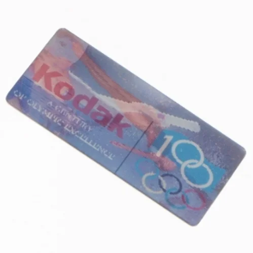 Atlanta 1996 Olympiske Lege Kodak Sponsor Pin (str. 4,5 x 2,5 cm)