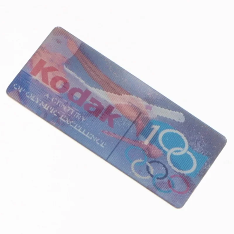 Atlanta 1996 Olympiske Lege Kodak Sponsor Pin (str. 4,5 x 2,5 cm)