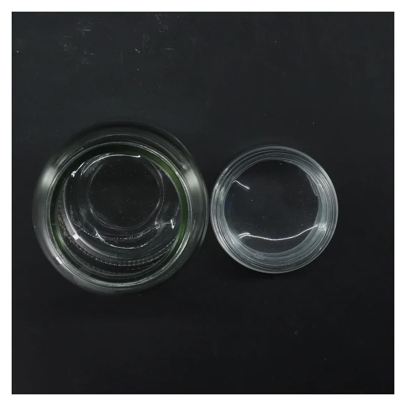 Glaskrukke med låg (str. Ø 8 cm længde 17,5 cm)