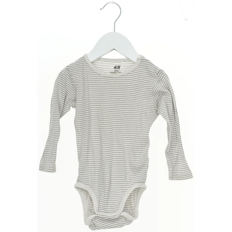 Langærmet bodystocking med striber fra H&M (str. 80)