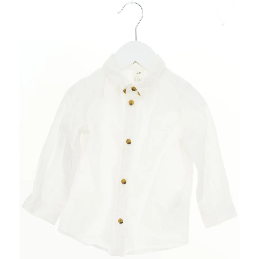 Hvid skjorte med knapper fra H&M (str. 80)