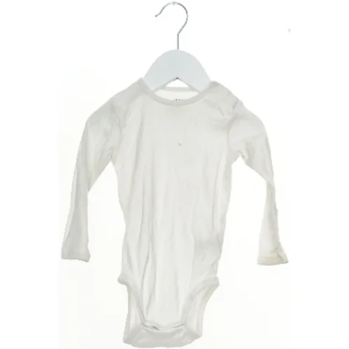 Hvid bodystocking med lange ærmer fra H&M (str. 80)