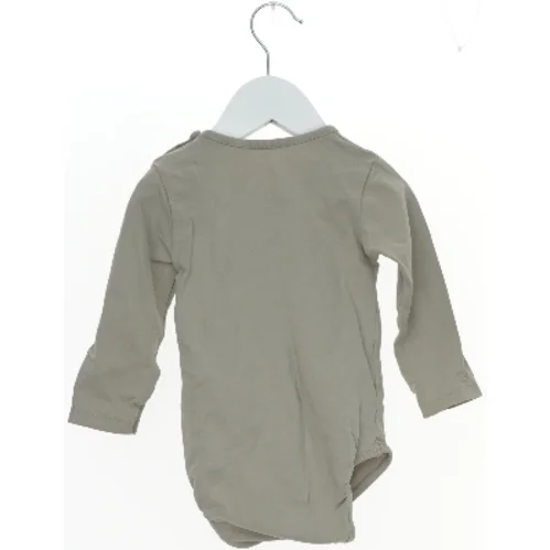 Langærmet bodystocking med tiger fra The New (str. 80)