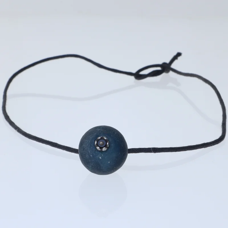 Simple black cord necklace with blue pendant (str. 60 cm)