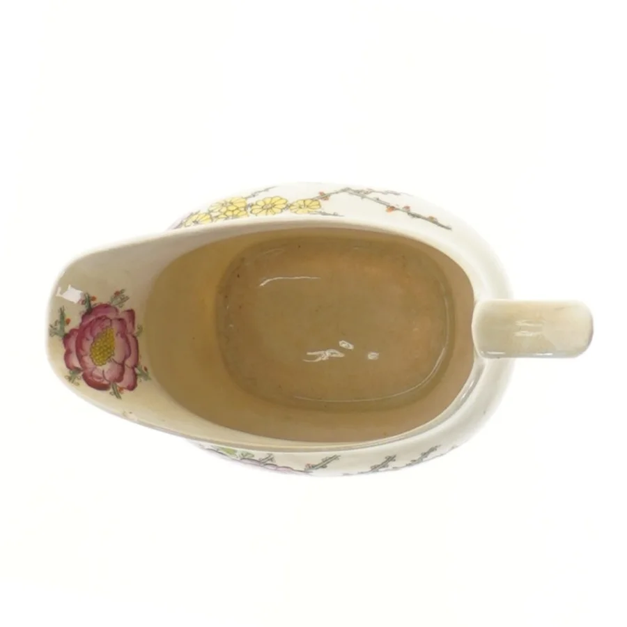 Porcelænsflødekande med blomstermotiv (str. 14,5x10 cm)