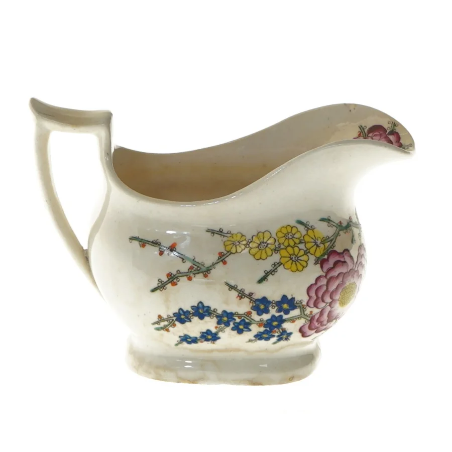 Porcelænsflødekande med blomstermotiv (str. 14,5x10 cm)