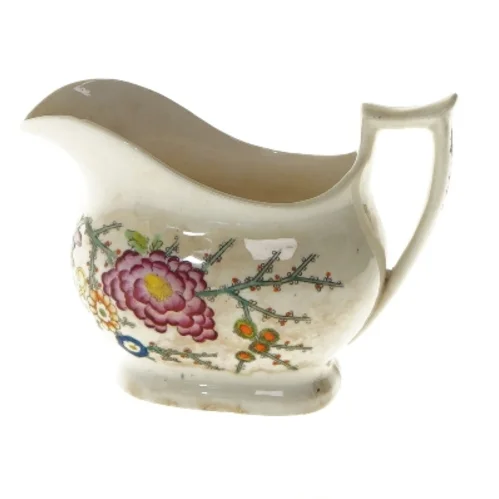 Porcelænsflødekande med blomstermotiv (str. 14,5x10 cm)