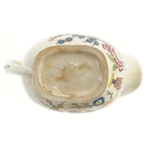Porcelænsflødekande med blomstermotiv (str. 14,5x10 cm)