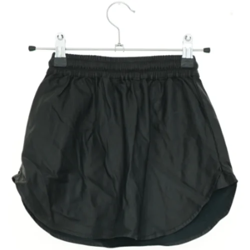 Nederdel fra Petit (str. 116 cm)