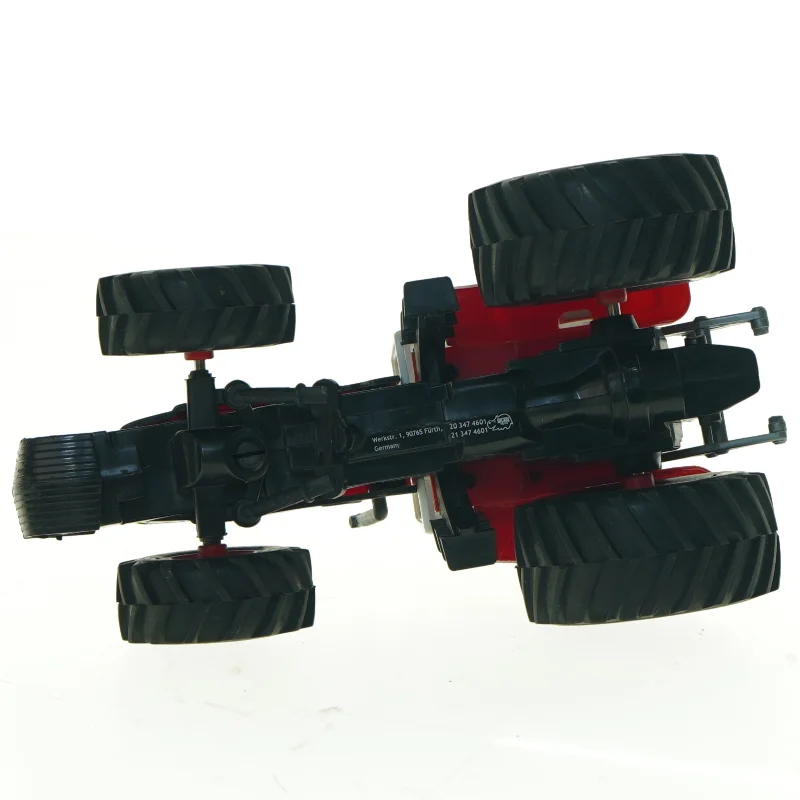 Brugt legetøjstraktor med figur (str. 20 x 11,5 cm)