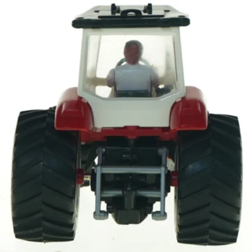 Brugt legetøjstraktor med figur (str. 20 x 11,5 cm)