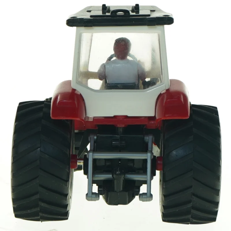 Brugt legetøjstraktor med figur (str. 20 x 11,5 cm)