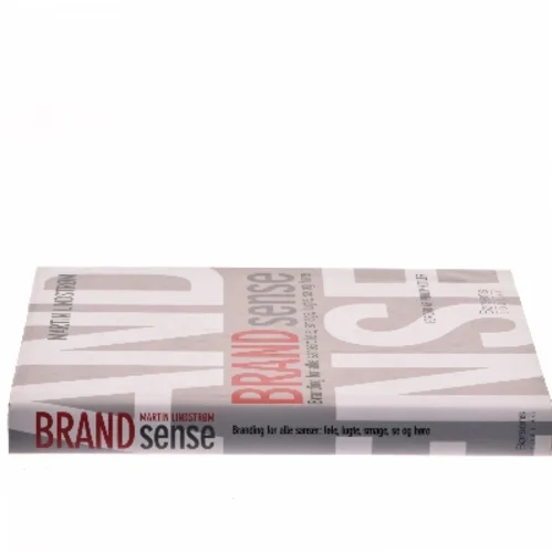 Brand sense : branding for alle sanser: føle, smage, lugte, se og høre af Martin Lindstrøm (Bog)