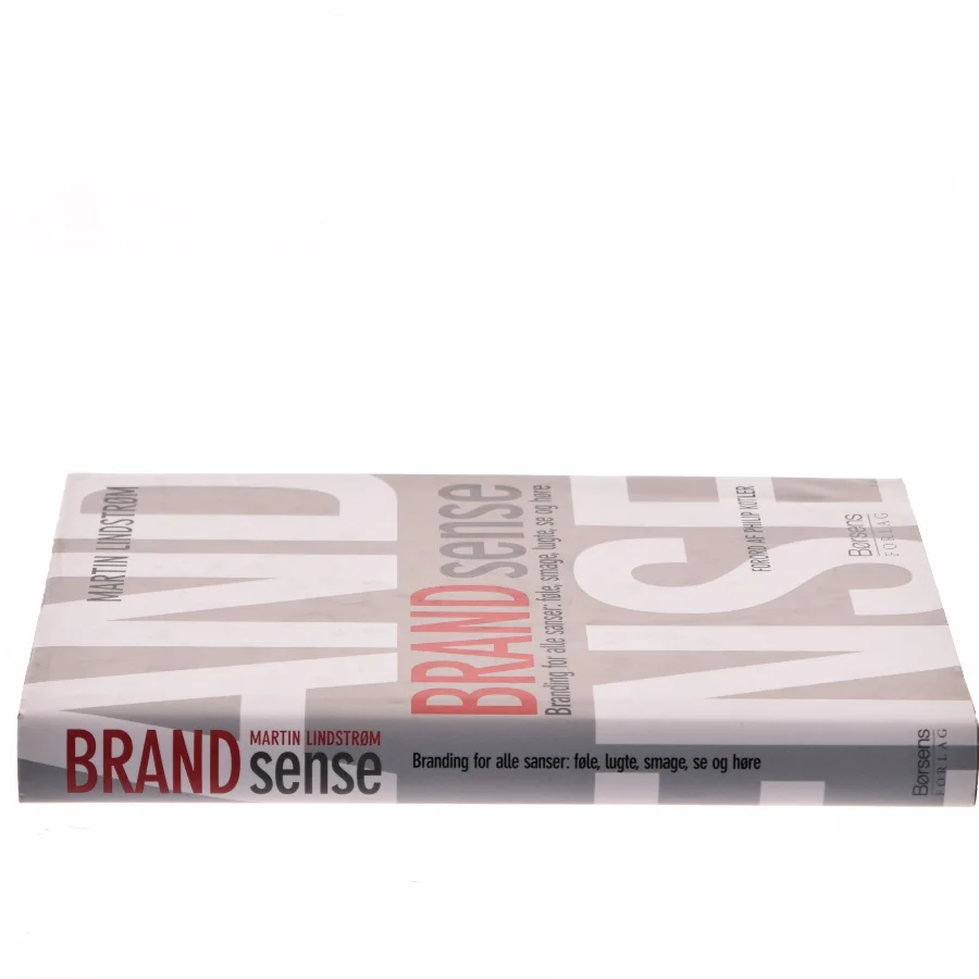Brand sense : branding for alle sanser: føle, smage, lugte, se og høre af Martin Lindstrøm (Bog)