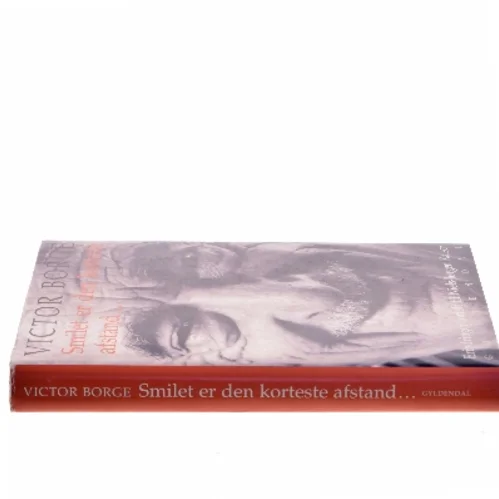 Smilet er den korteste afstand... (Bog)