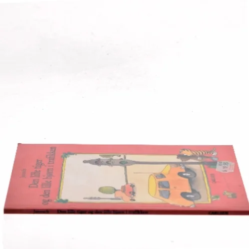 Den lille tiger og den lille bjørn i trafikken : historien om dengang den lille tiger og den lille bjørn tog ind til byen af Janosch (Bog)