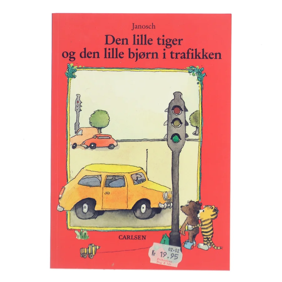 Den lille tiger og den lille bjørn i trafikken : historien om dengang den lille tiger og den lille bjørn tog ind til byen af Janosch (Bog)