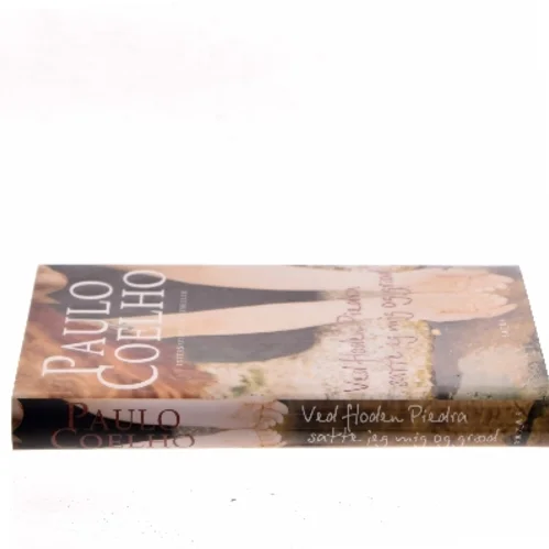 Ved floden Piedra satte jeg mig og græd af Paulo Coelho (Bog)