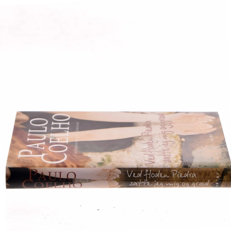 Ved floden Piedra satte jeg mig og græd af Paulo Coelho (Bog)
