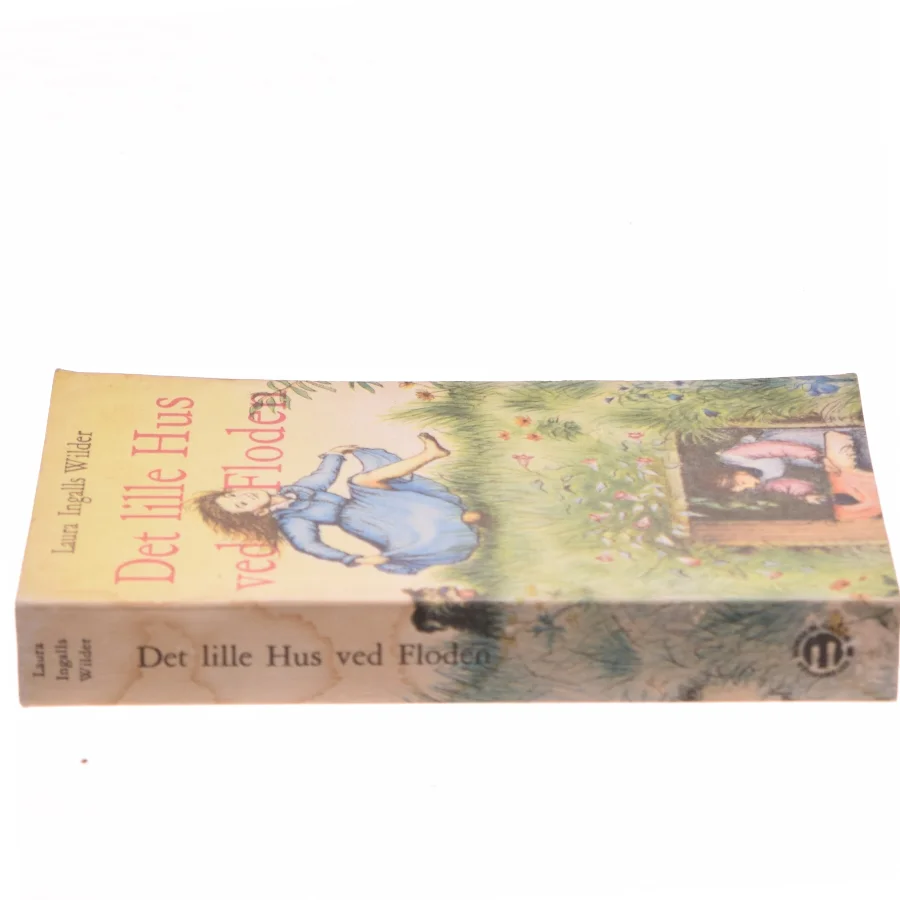 Det lille Hus ved Floden af Laura Ingalls Wilder (Bog)